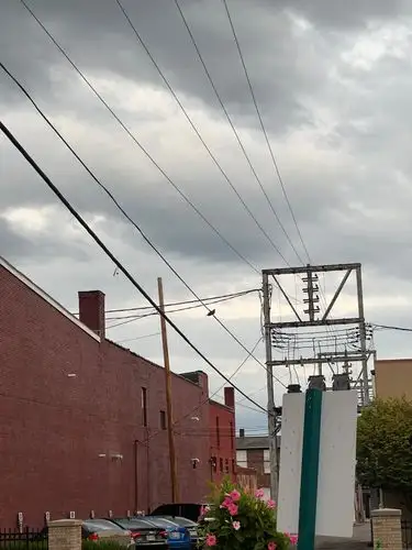 City infrastructure against a dramatic sky.
